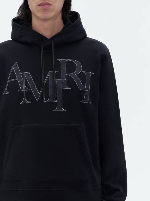 AMIRI menn svart merke hettegenser med forskjøvet logo NFBX140